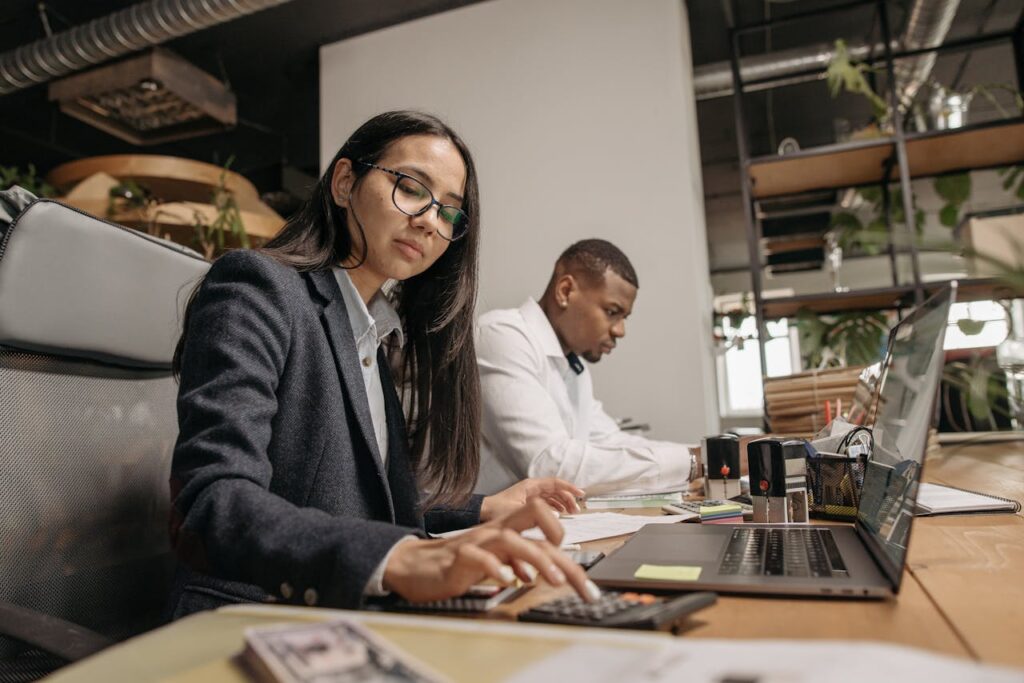 Man and Woman Working at the Office